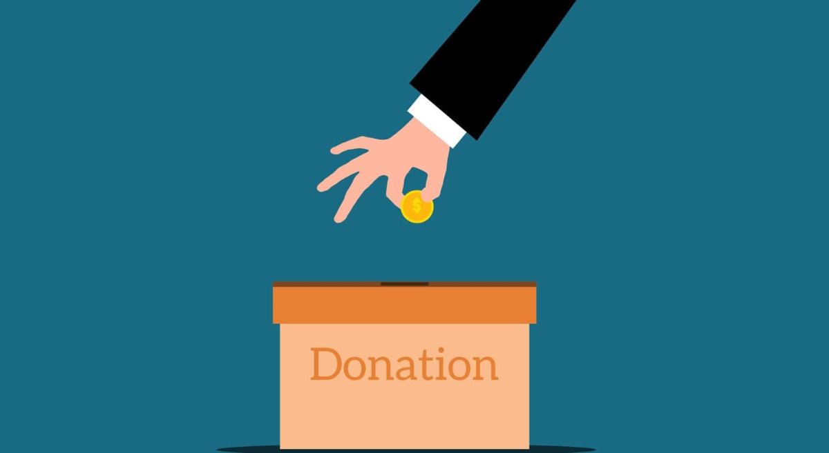 an illustration of a person donated a coin to a box reading "donation"